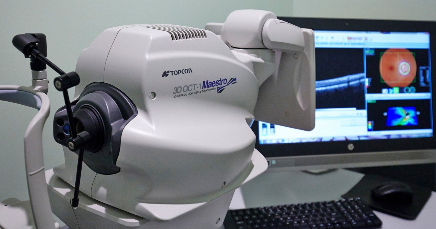 Advanced AI diagnostic technology analyzing medical data on multiple screens